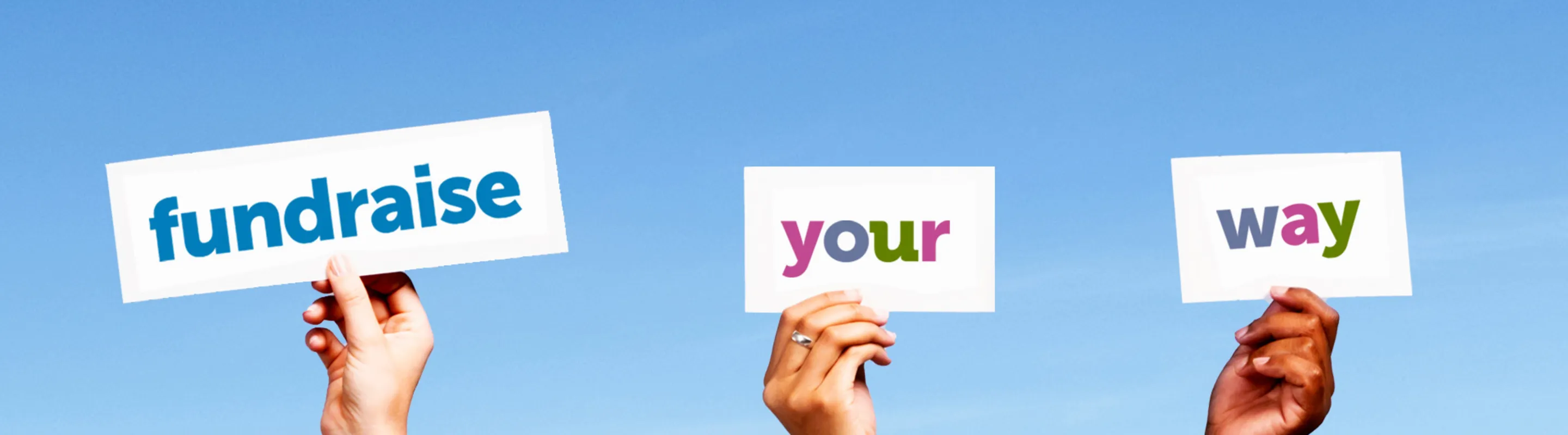 three hands hold signs reading fundraise your way