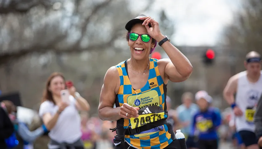 A marathon runner smiling