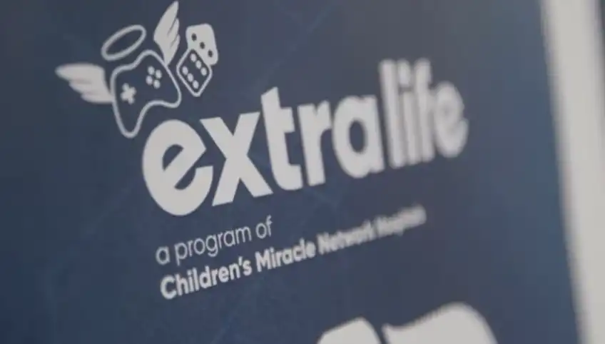 A sign that reads "extra life, a program of Children's Miracle Network"