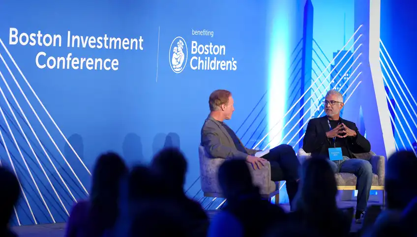 Two speakers on state at the Boston Investment Conference event for BCH