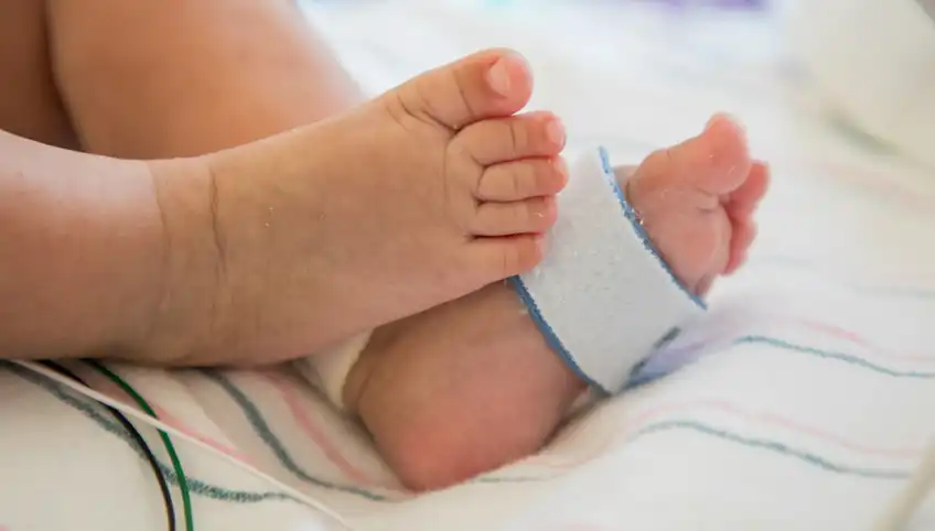 baby feet with monitoring equipment