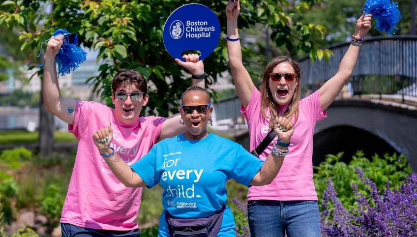 Volunteers cheering at an event