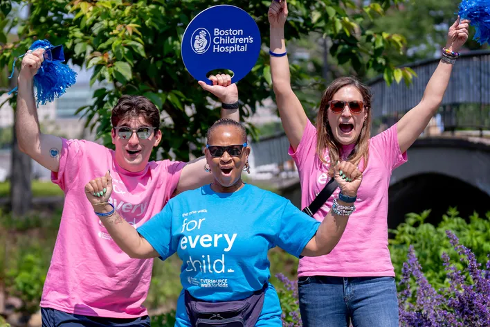 Volunteers cheering at an event