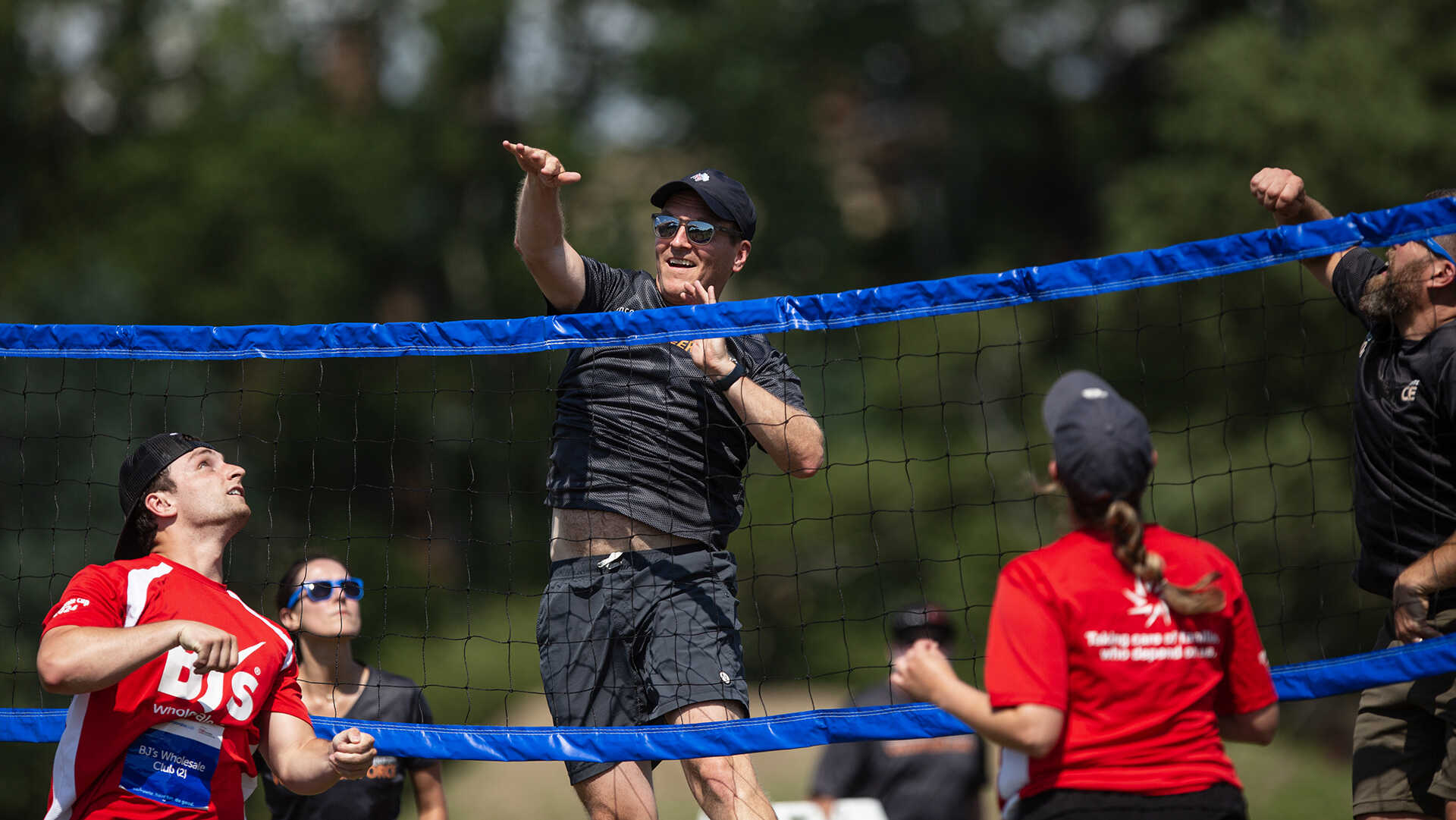 Attendee playing Volleyball at Corporate Cup event for Boston Childrens Hospital